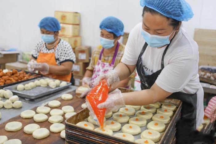 �ӱ�ʯ���f������� ���y(t��ng)�ֹ�������a(ch��n)æ